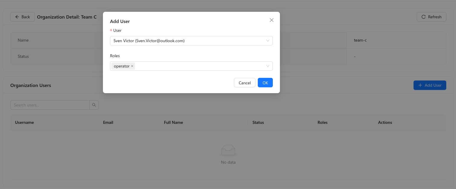 Organization detail: add a user and assign organization roles